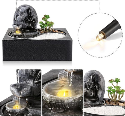 Living Indoor Fountain Table Fountain, Polyresin Fountain, LED Lighting, Table Top Water Fountain with Sand Stones & Plant Decorations, Sitting Buddha Fountain, 29 x 21 x 23 cm