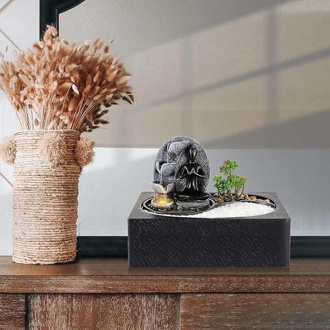 Living Indoor Fountain Table Fountain, Polyresin Fountain, LED Lighting, Table Top Water Fountain with Sand Stones & Plant Decorations, Sitting Buddha Fountain, 29 x 21 x 23 cm